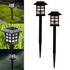 Three solar outdoor lights creating a bright, welcoming ambiance in a garden at night.