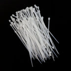 Bundle of 3x100mm heavy-duty black nylon cable ties, ready for use.