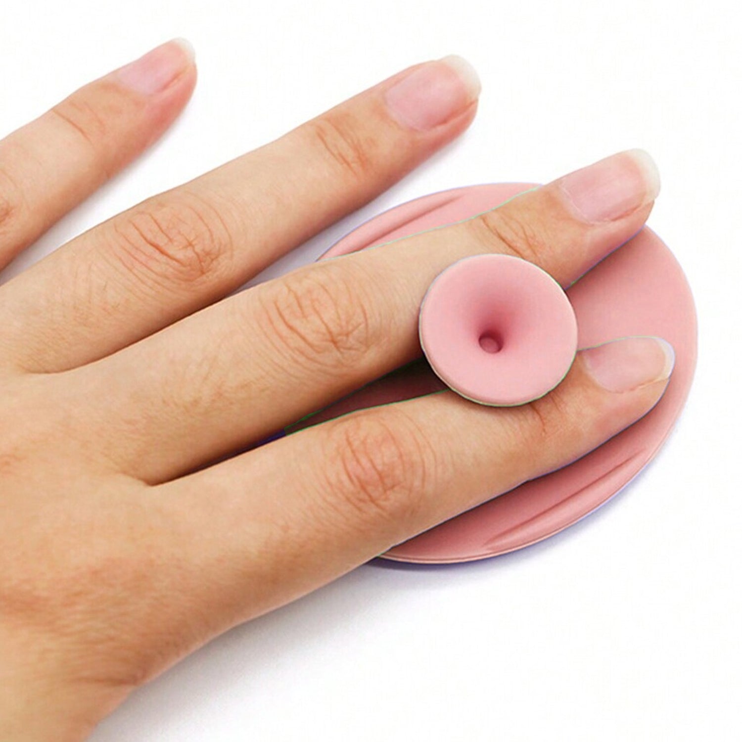 Clean silicone facial cleansing brush after use, showing its hygienic design.