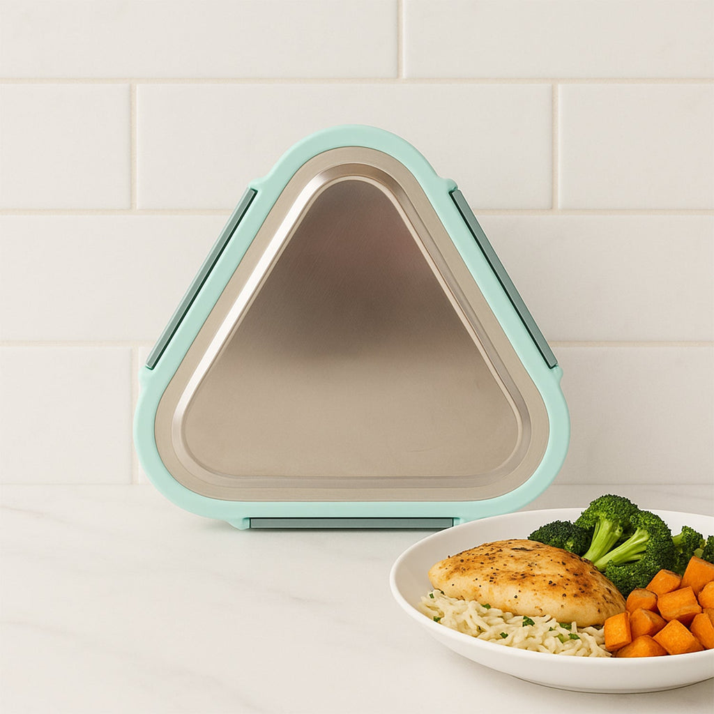 Close-up of Ganesh Trinity triangle lunch box leak-resistant locking clip