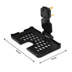 Wall-mounted PHOBIA black phone charging holder in use, keeping the device safe.