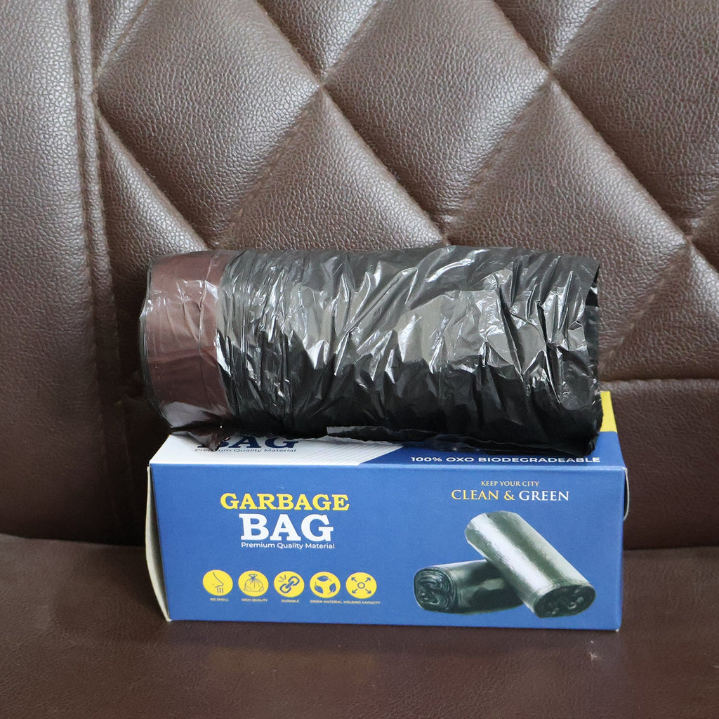 Neatly stored roll of heavy duty garbage bags, ideal for small spaces.