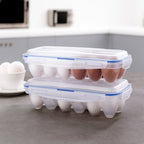 Clear egg storage box tray holding 12 eggs with the secure lid on.