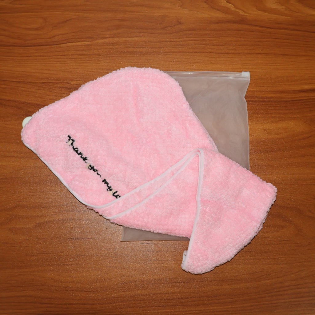 Button lock feature on microfiber hair drying towel wrap