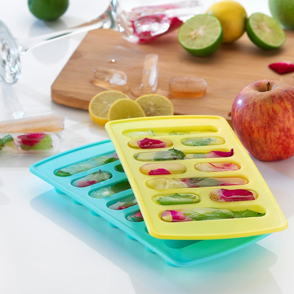 Ice trays filled with ice cubes, ready for storage