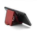 Adjustable phone stand in use on a wooden desk, perfect for video calls.