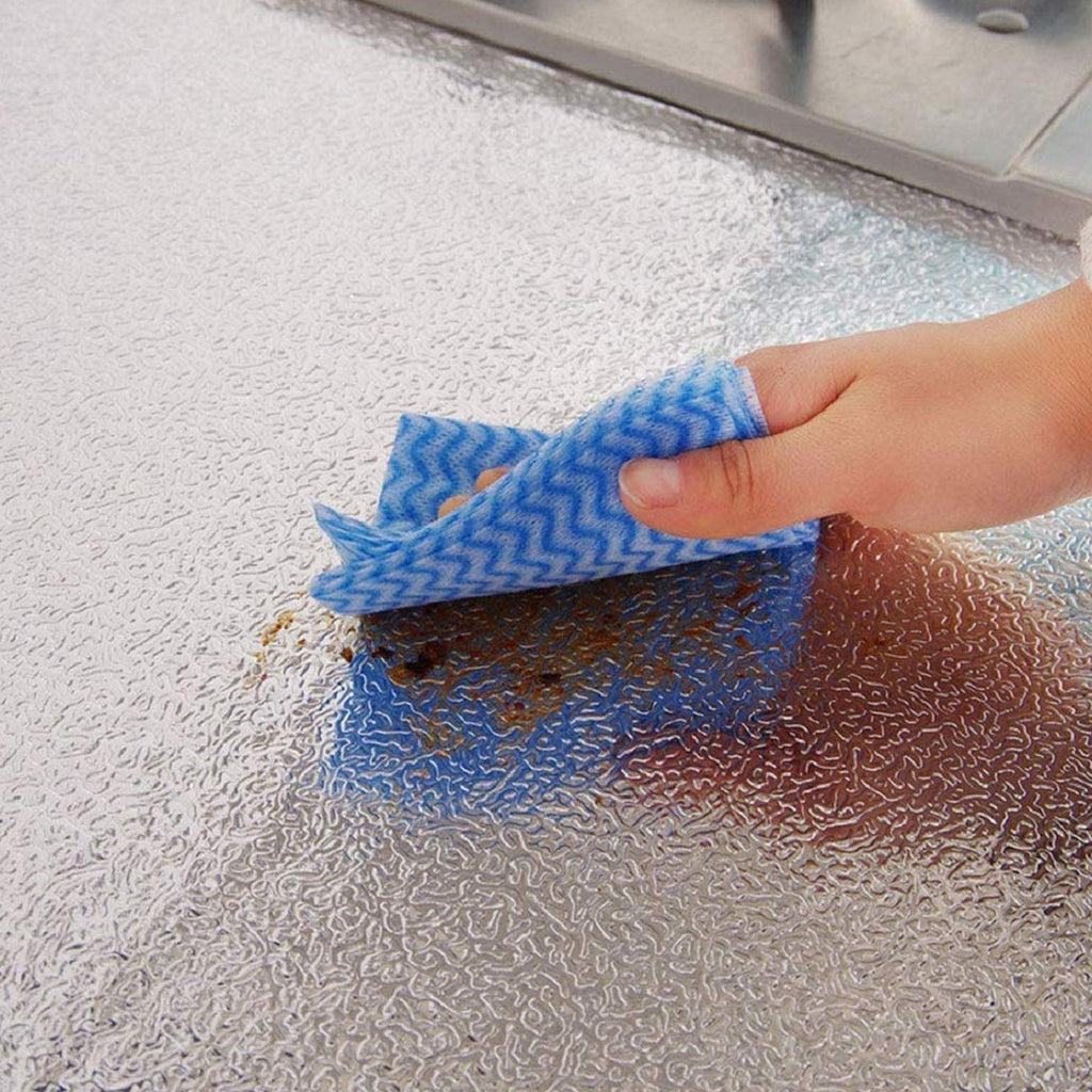 Modern kitchen backsplash featuring easy-to-clean aluminum foil wallpaper.