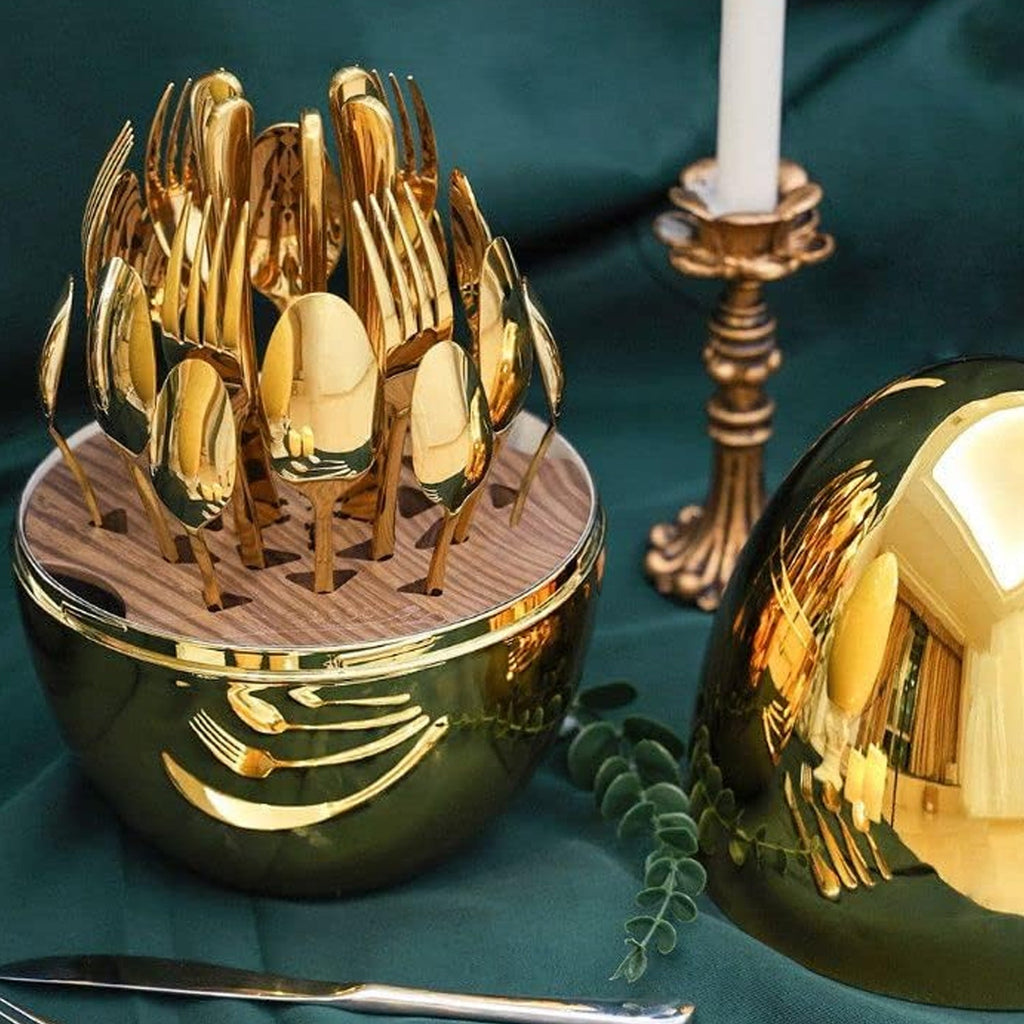 Complete golden cutlery set gracefully displayed on a sophisticated table setting.