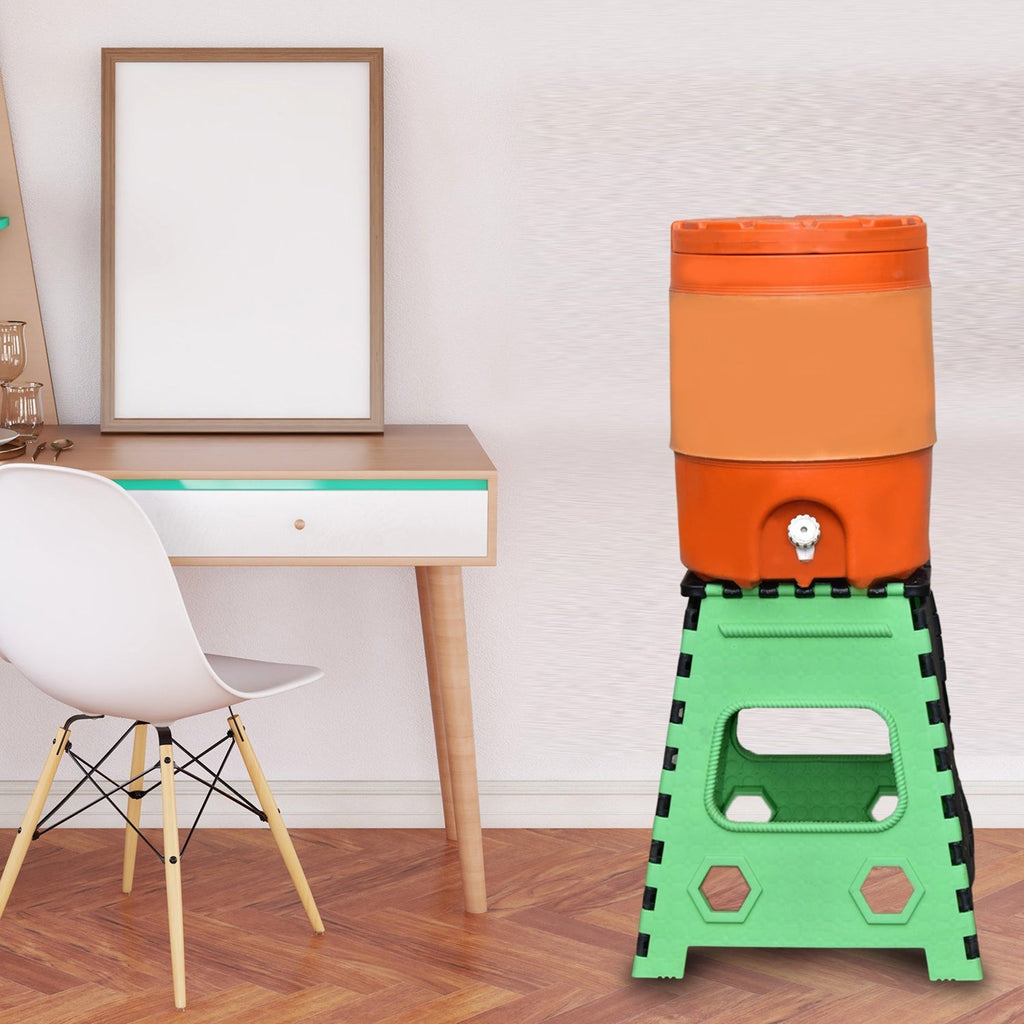 Versatile 18-inch brown folding stool being used by an adult for a high shelf.
