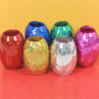 Multicolor curling ribbon rolls displayed for festive party decorations.
