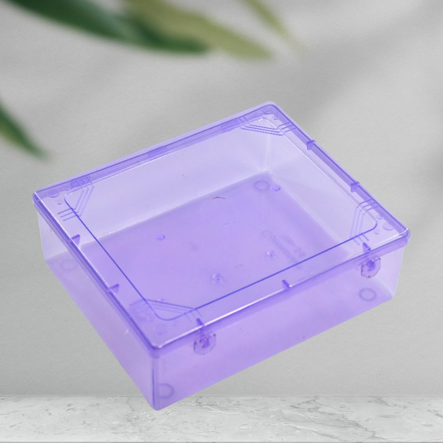Clear plastic airtight food storage container for kitchen organisation.