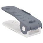 Adjustable shoe organizer providing efficient space-saving storage for one pair of shoes.