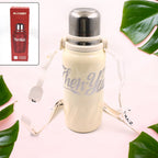 Lifestyle image of the sleek stainless steel water bottle on a clean background.
