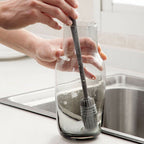 Multipurpose bottle cleaning brush with ergonomic handle for kitchen use.