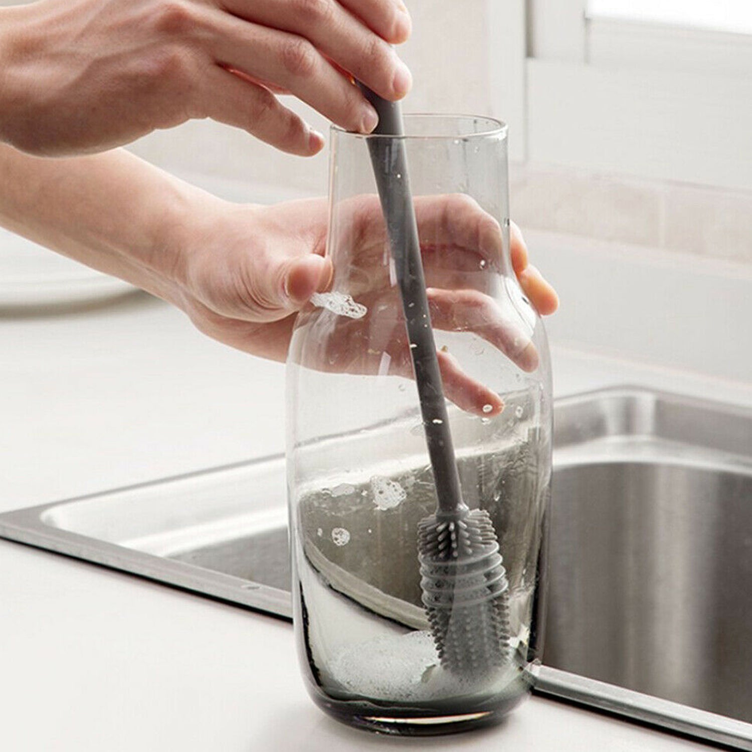 Multipurpose bottle cleaning brush with ergonomic handle for kitchen use.