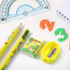 Multiple angles of dinosaur printed kids stationery set showing full kit