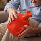 Textured rubber hot water bag to evenly distribute warmth on body