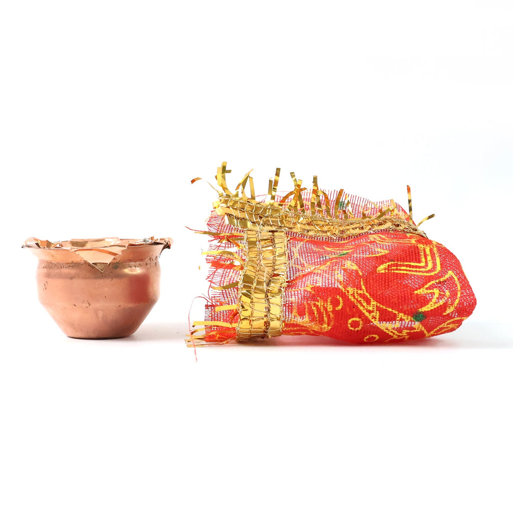 Glowing mini kalash pooja set used for daily aarti and festive celebrations