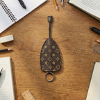 Travel-friendly key organizer featuring an elegant patterned design