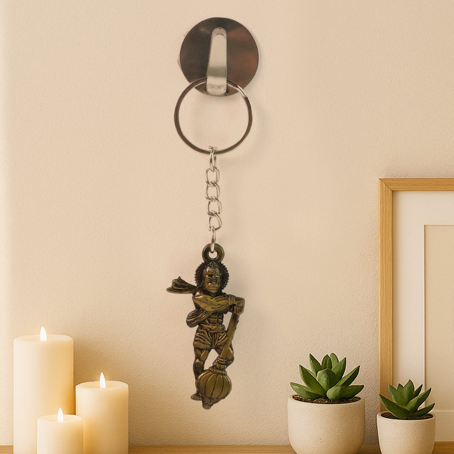 Religious Bajrangbali metal keychain displaying spiritual symbol