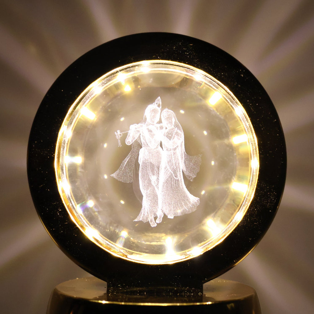 Golden base Radhe Krishna decorative lamp emitting soft ambient LED light