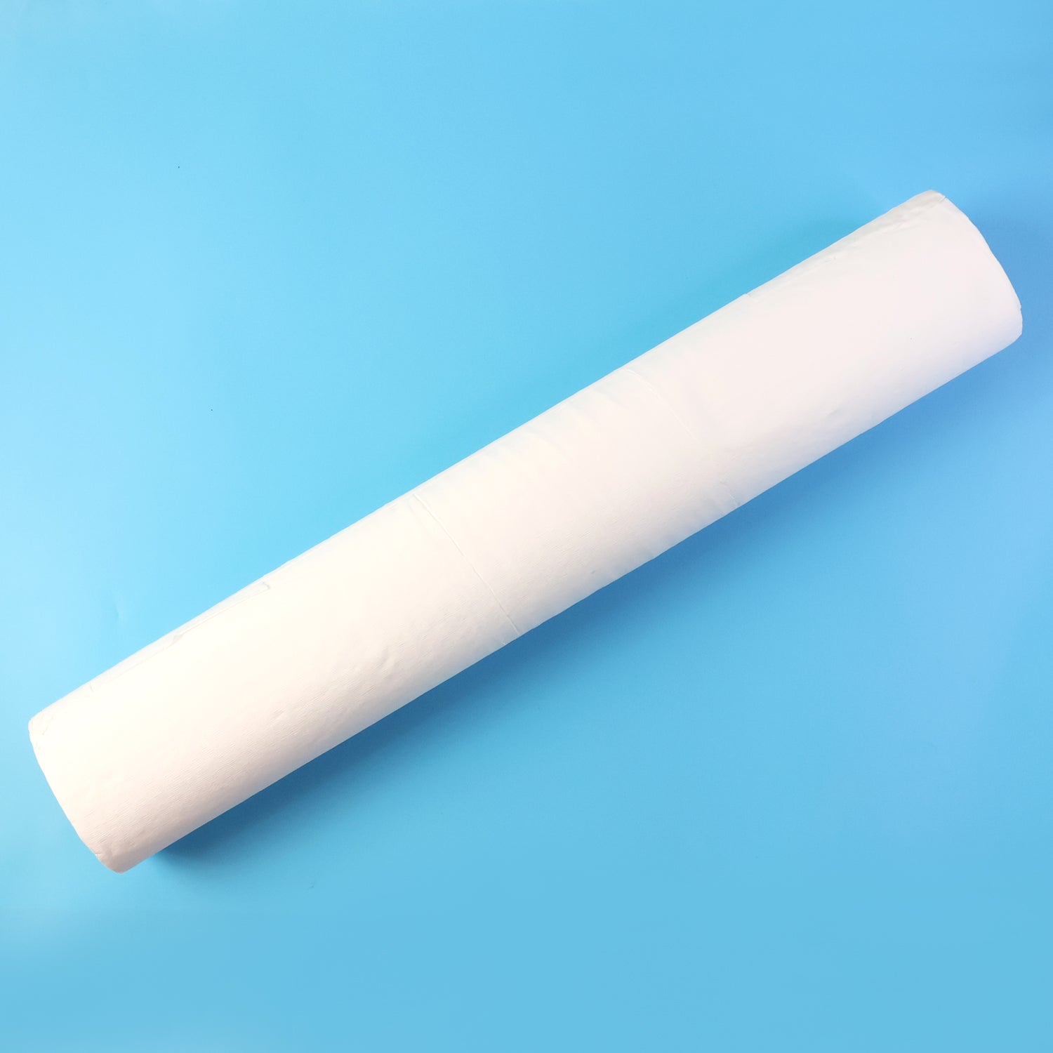 Roll of medical couch paper tissue ready for use in healthcare facilities