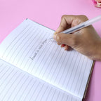 Single fine tip black gel pen with smooth ink flow and transparent design