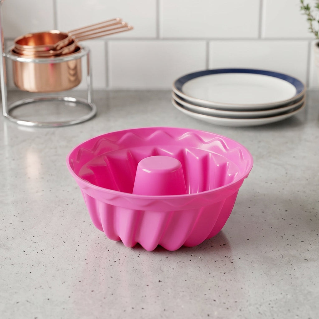 Single pink silicone cupcake mould for baking