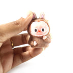 Cartoon dinosaur themed eraser with integrated pencil sharpener