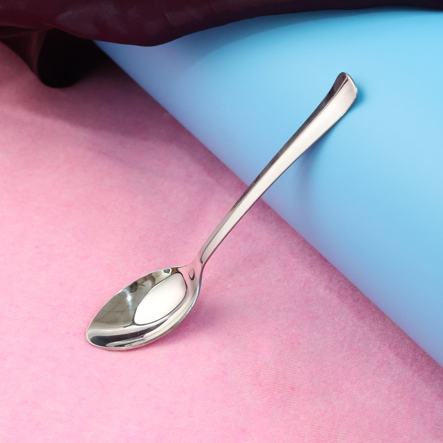 Set of three high-quality Stainless Steel Dining Spoons arranged neatly on a surface.