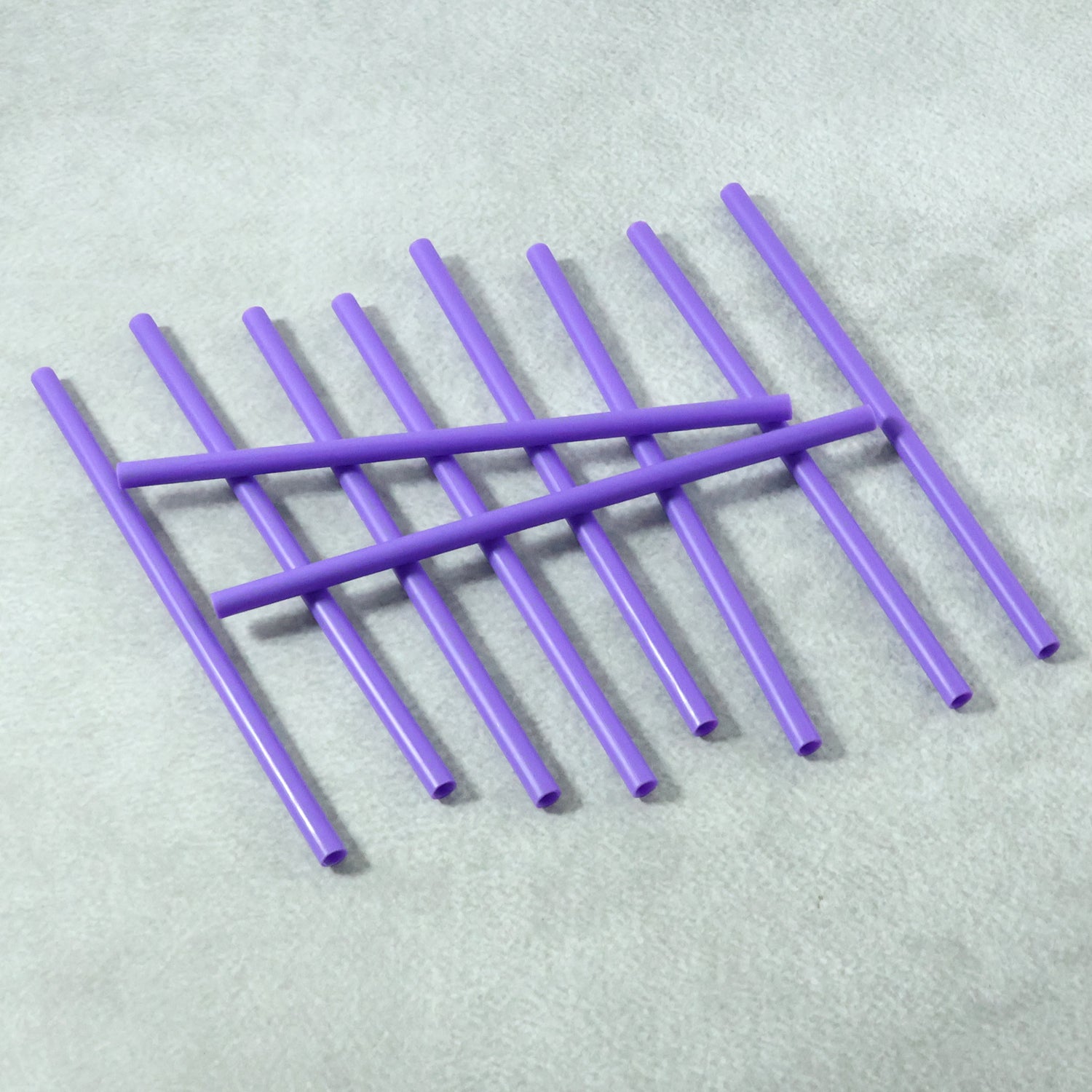 Set of eco-friendly reusable plastic straws for daily drink use