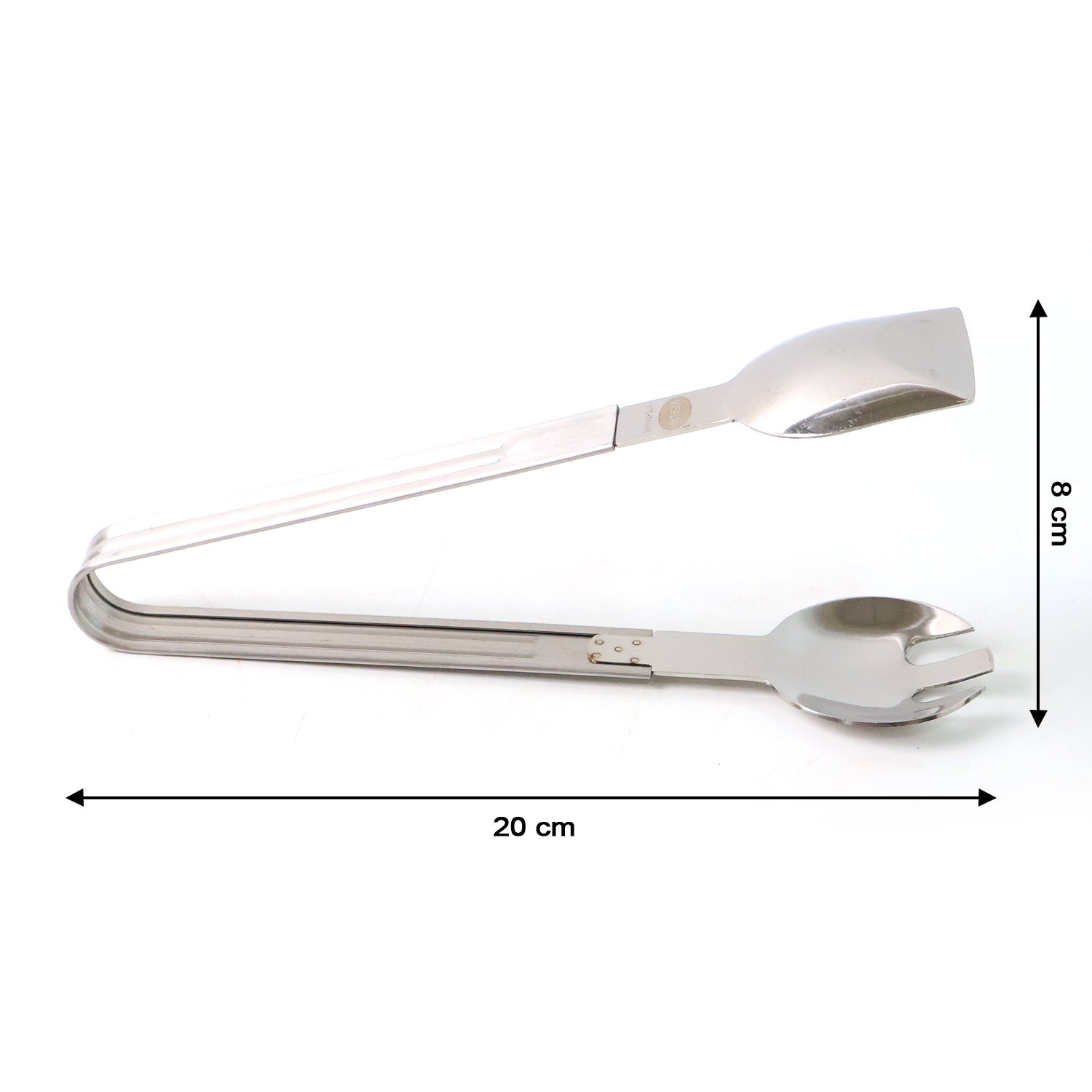 Salad being served with stainless steel multipurpose serving tong