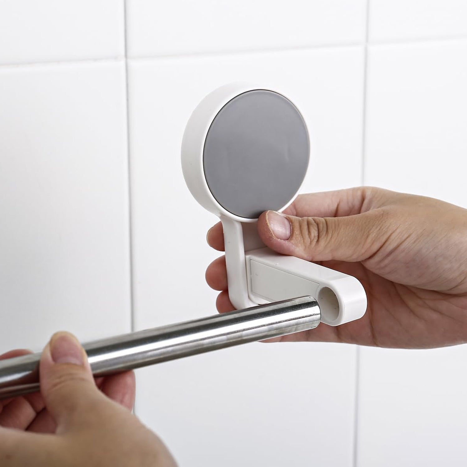 Close-up of rust-resistant metal rod of self-adhesive towel hanger