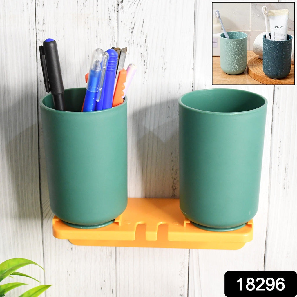 Close-up of the self-adhesive toothbrush holder showing slots for toothbrushes and toothpaste.