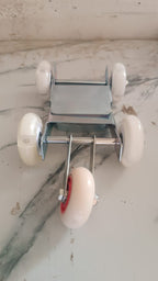 Garage tool for motorcycle front wheel repositioning and parking