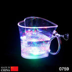 Heart-shaped LED Glass Cup glowing with colorful lights at a party.