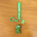 Front view of colorful dinosaur cartoon keychain with silicone strap
