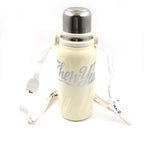 The 1200ML hot and cold water bottle being carried comfortably by its handle.