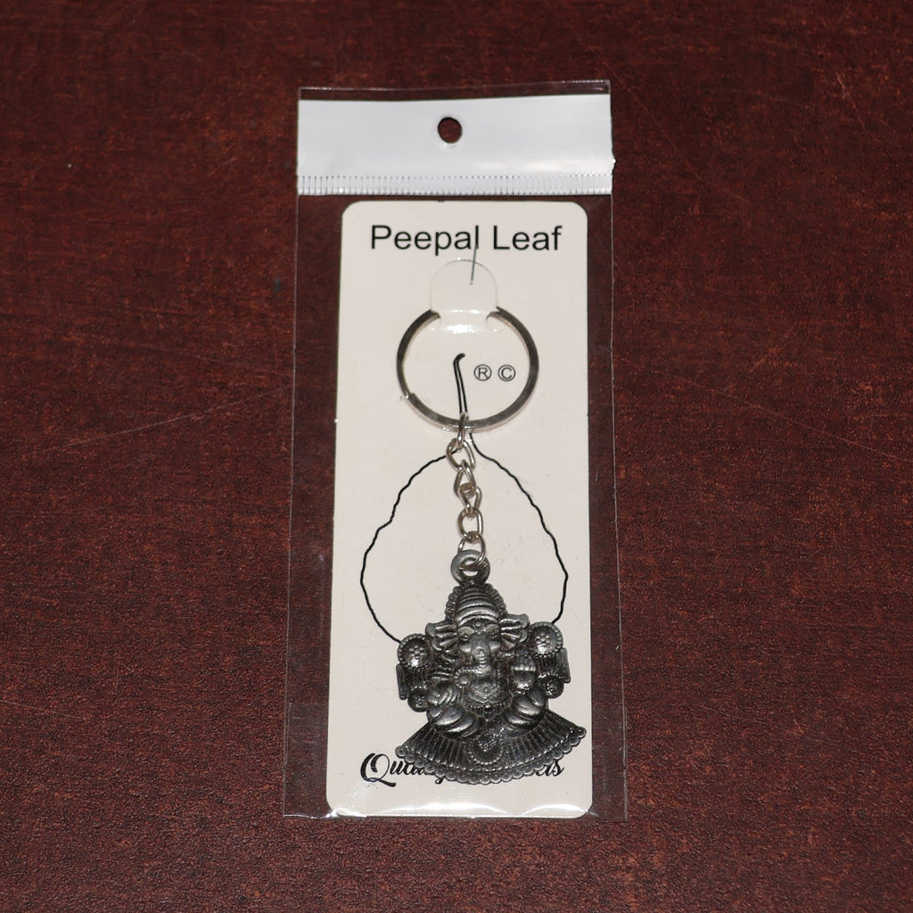 Lord Ganesha keychain packaged in Peepal leaf blister pack