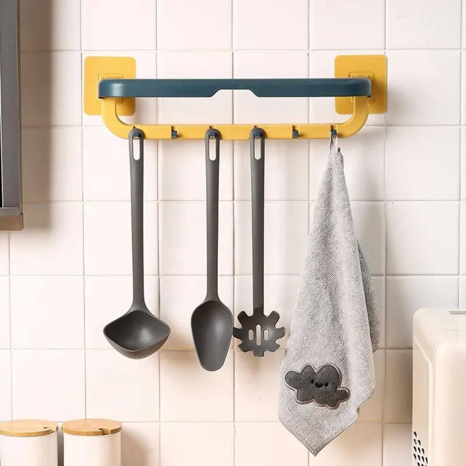Close-up of the integrated hooks and the sturdy ABS plastic construction of the folding towel shelf.
