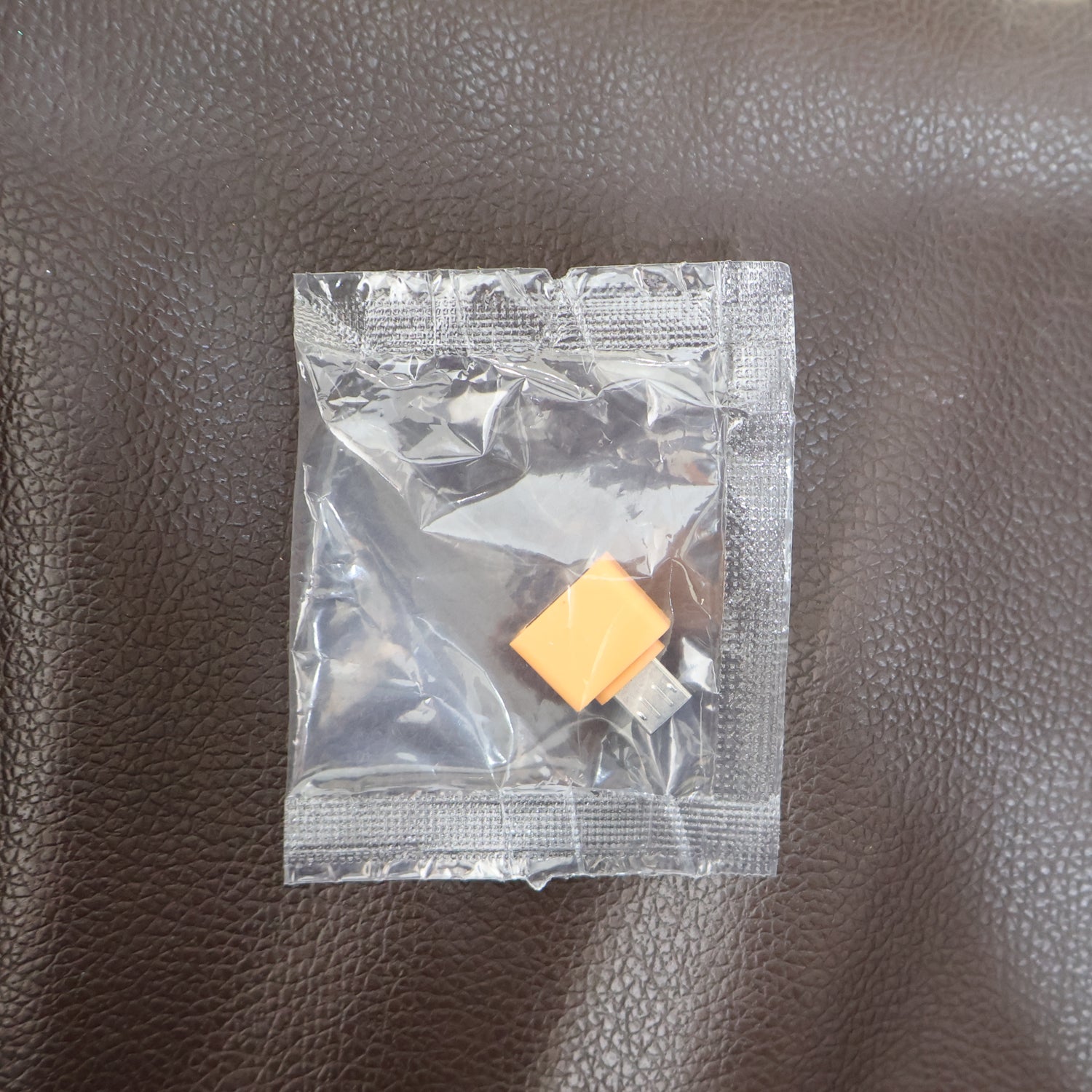 Micro USB OTG Adapter in use, connecting a peripheral to a smartphone for enhanced functionality.