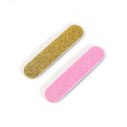 Hand holding a 9 cm double-sided professional nail file for scale