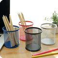 Black metal mesh pen holder, perfect for organizing an office desk.
