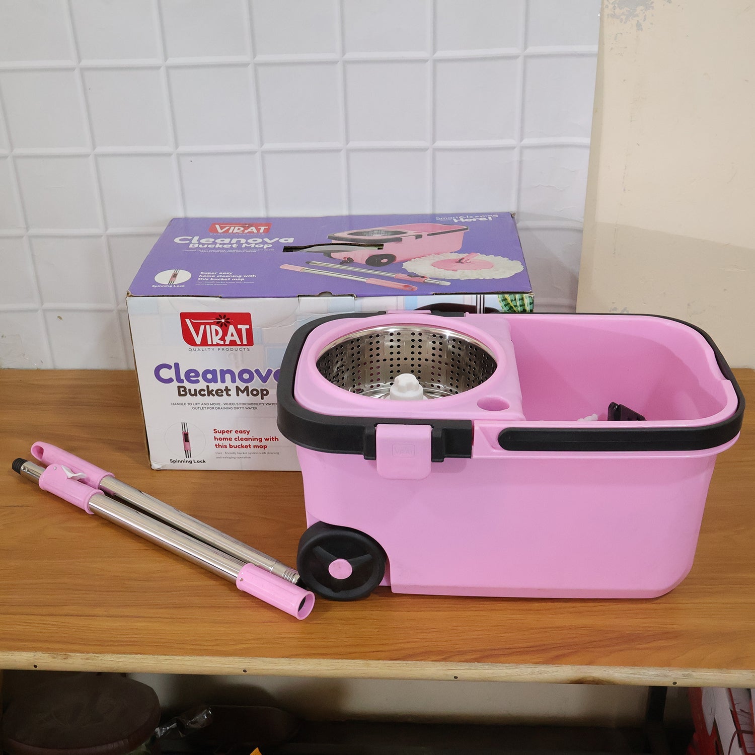 Compact storage view of the Quick Spin Mop and bucket set.