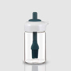 Glass oil dispenser with a brush, ideal for grilling, baking, or general cooking.