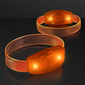 Multicolor LED running bracelet providing bright safety light in a dark environment.