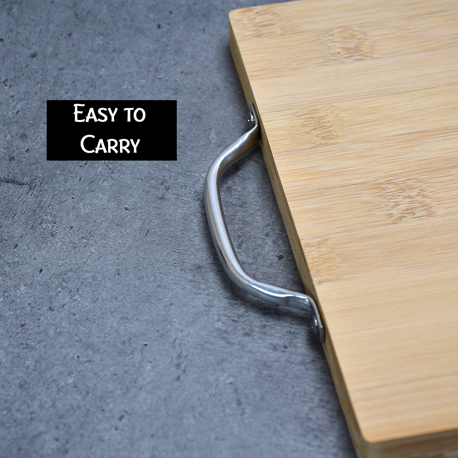 Thick cutting board made of bamboo, perfect for chopping vegetables.