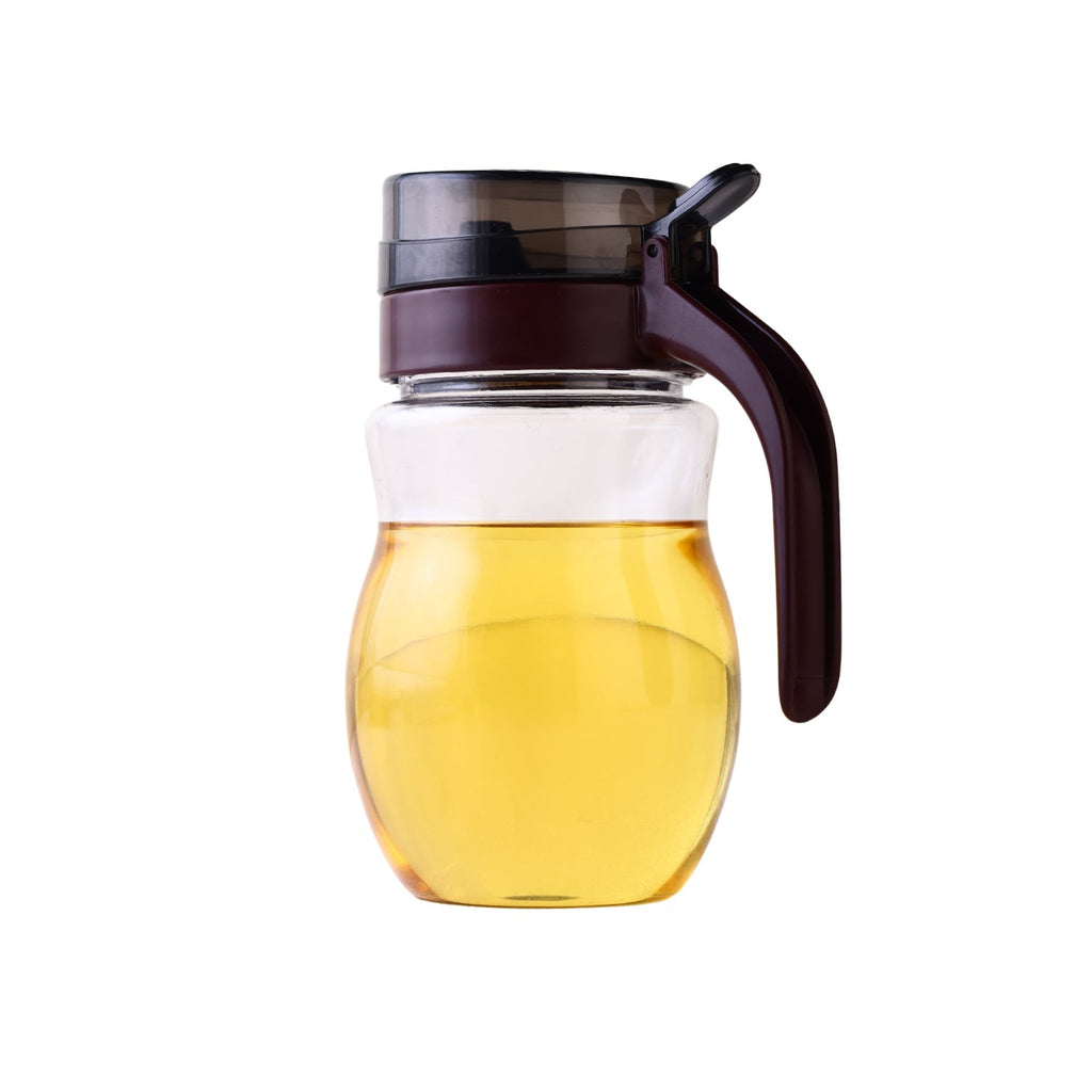 Food-grade plastic oil dispenser ensuring precise pouring.