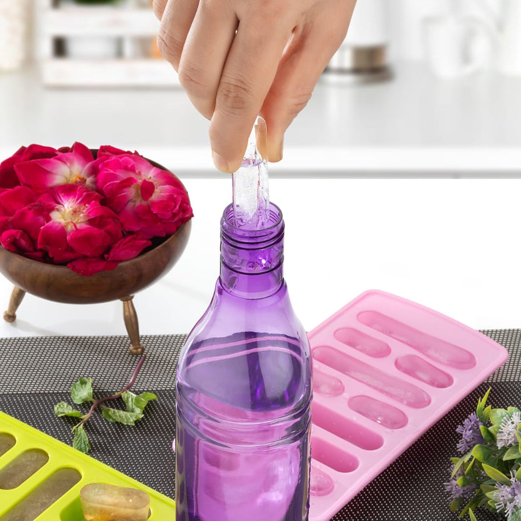 Close-up of ice trays stacked and ready to freeze