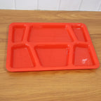 Multi-section plastic serving tray with smooth surface for quick washing